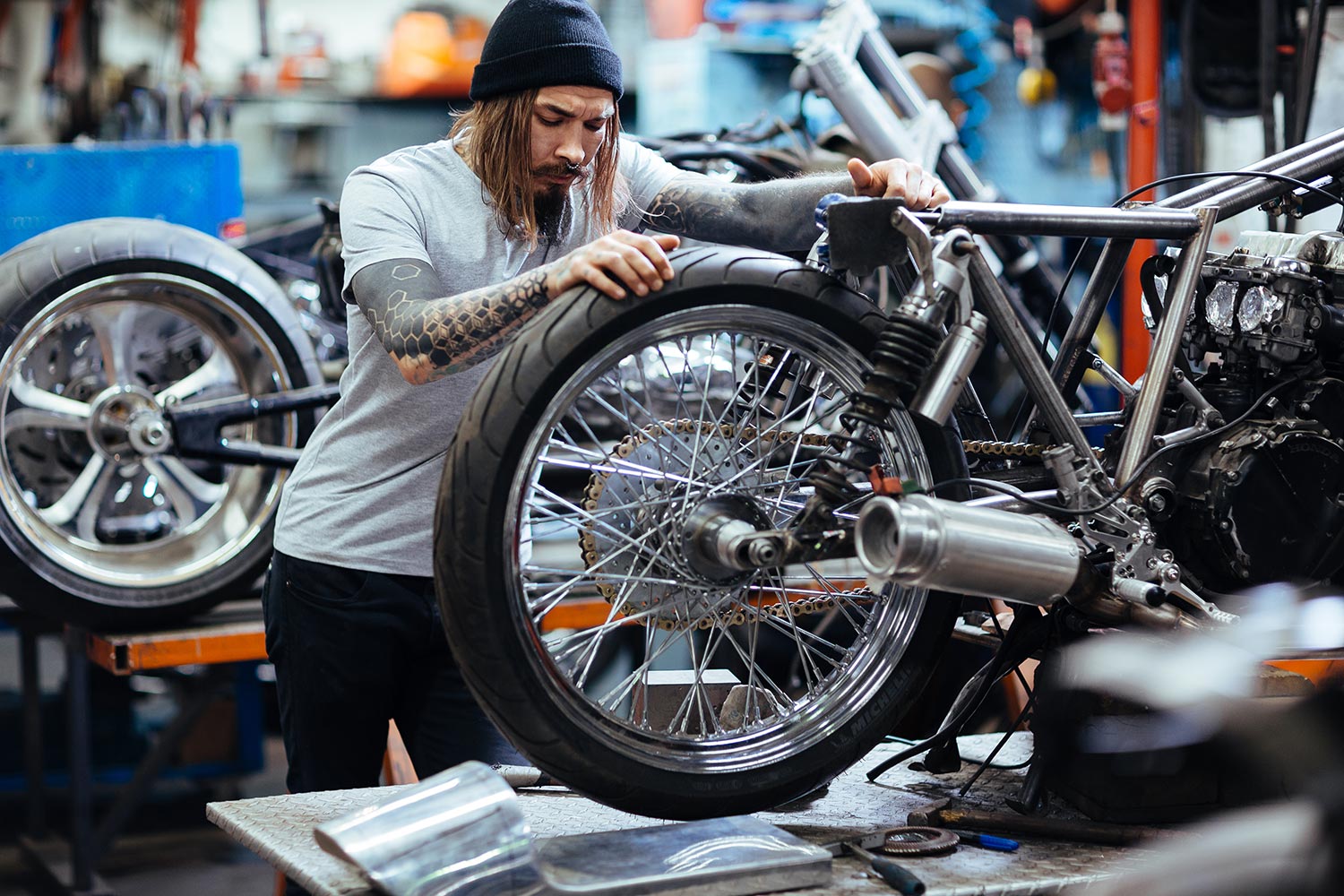repairing-motorcycle-PTCNT4K-resize.jpg
